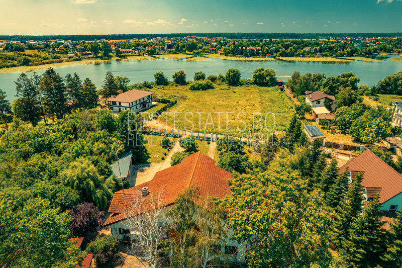Casa superba cu vedere la lac in Izvorani – piscina, natura,si potential imens!